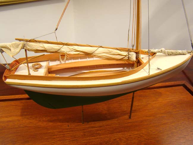 A scratch built model of a Herreshoff 12 1/2 circa 1900 in a 1:24 scale built by Cape Cod modeler Tom Lauria